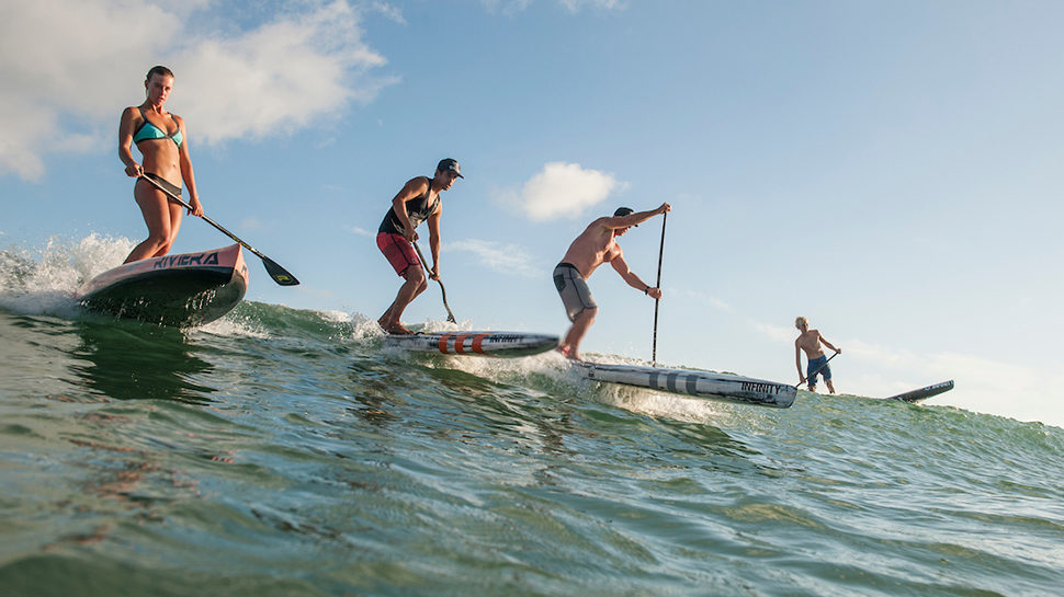 Dave Boehne, Karl Ring, Shae Foudy and other paddleboarders practice for the upcoming PPG at Doheny Beach, CA.